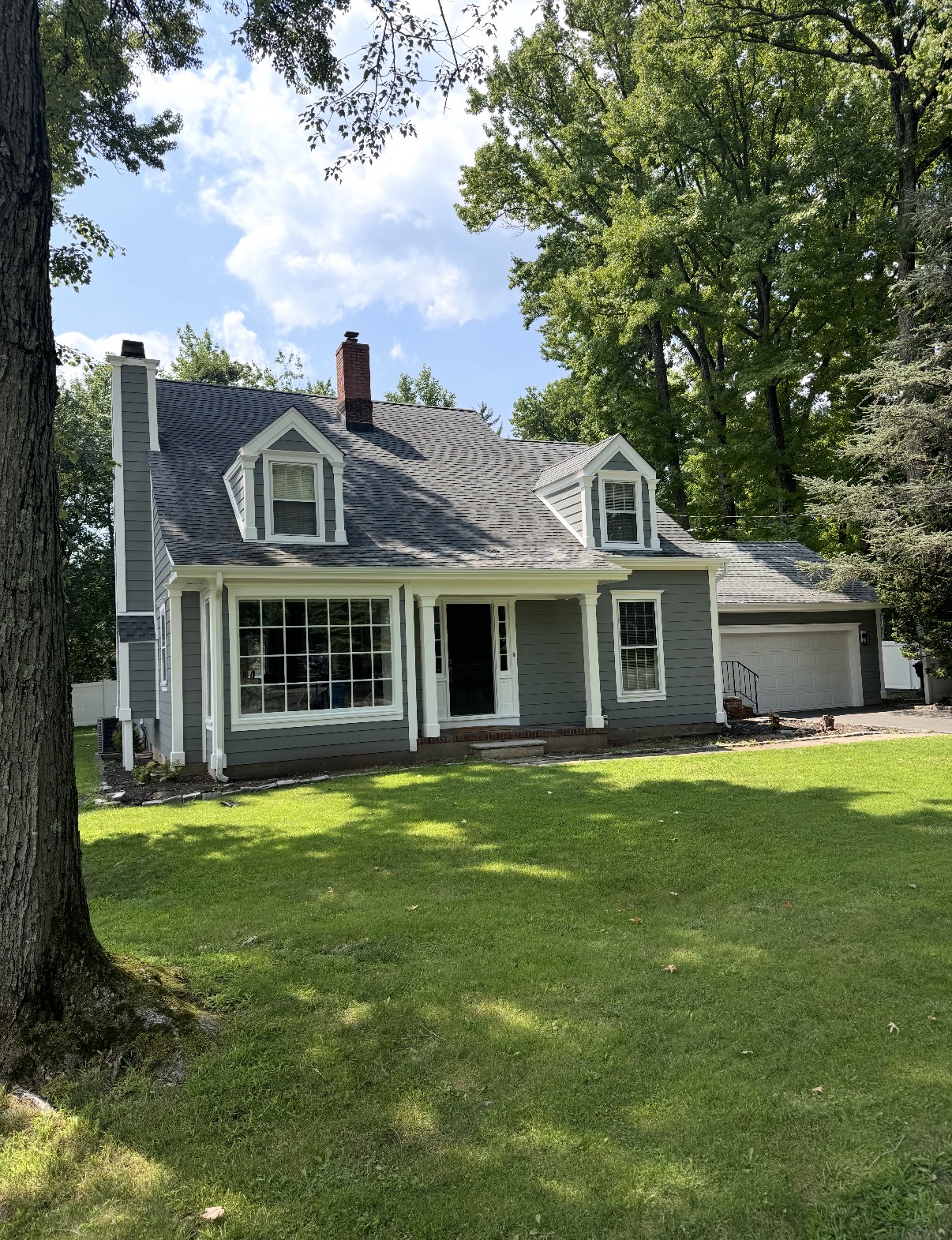 After — new GAF roof on cape colonial