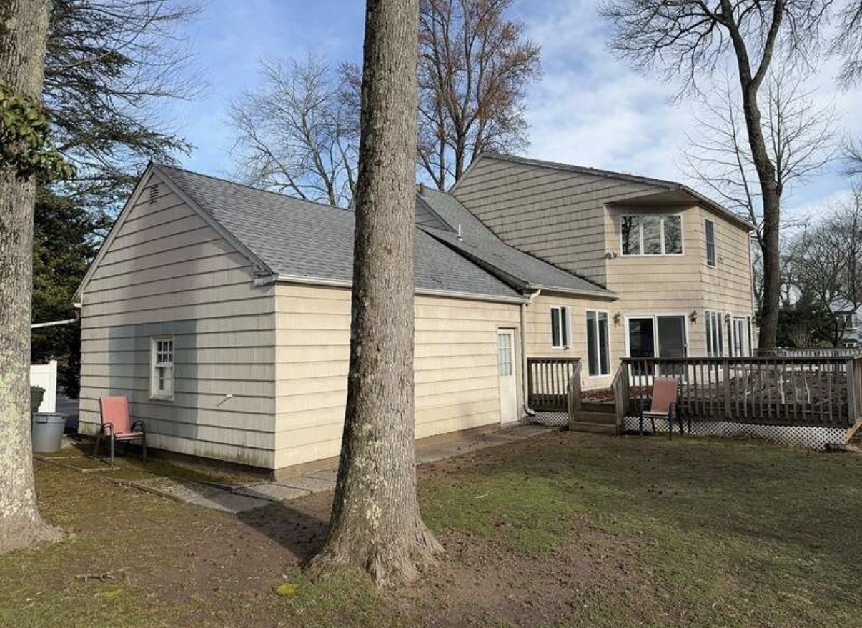 Before — back of house, old roof