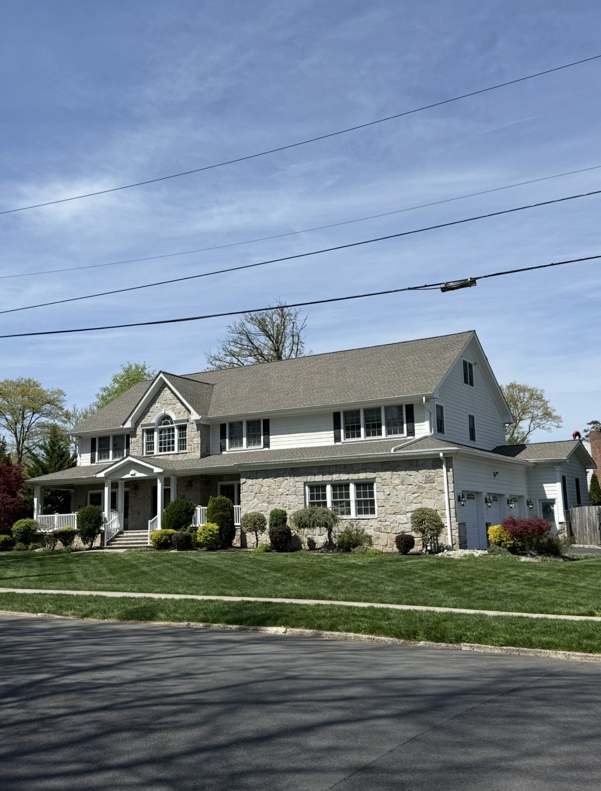 Large stone colonial with new roof