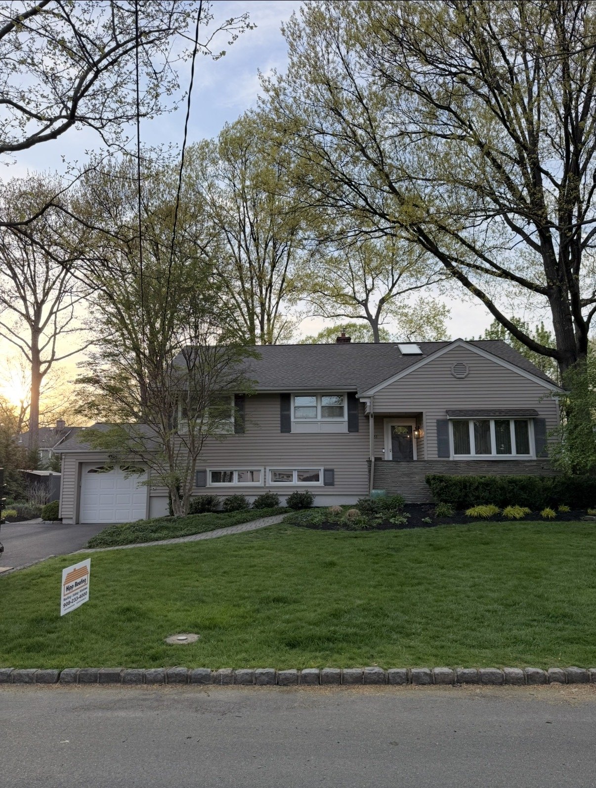 Hipp Roofing job complete with yard sign